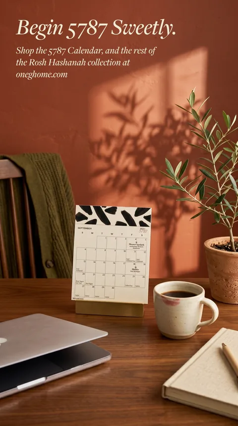 Ad: the 5787 calendar on a desk, Begin 5787 Sweetly.
