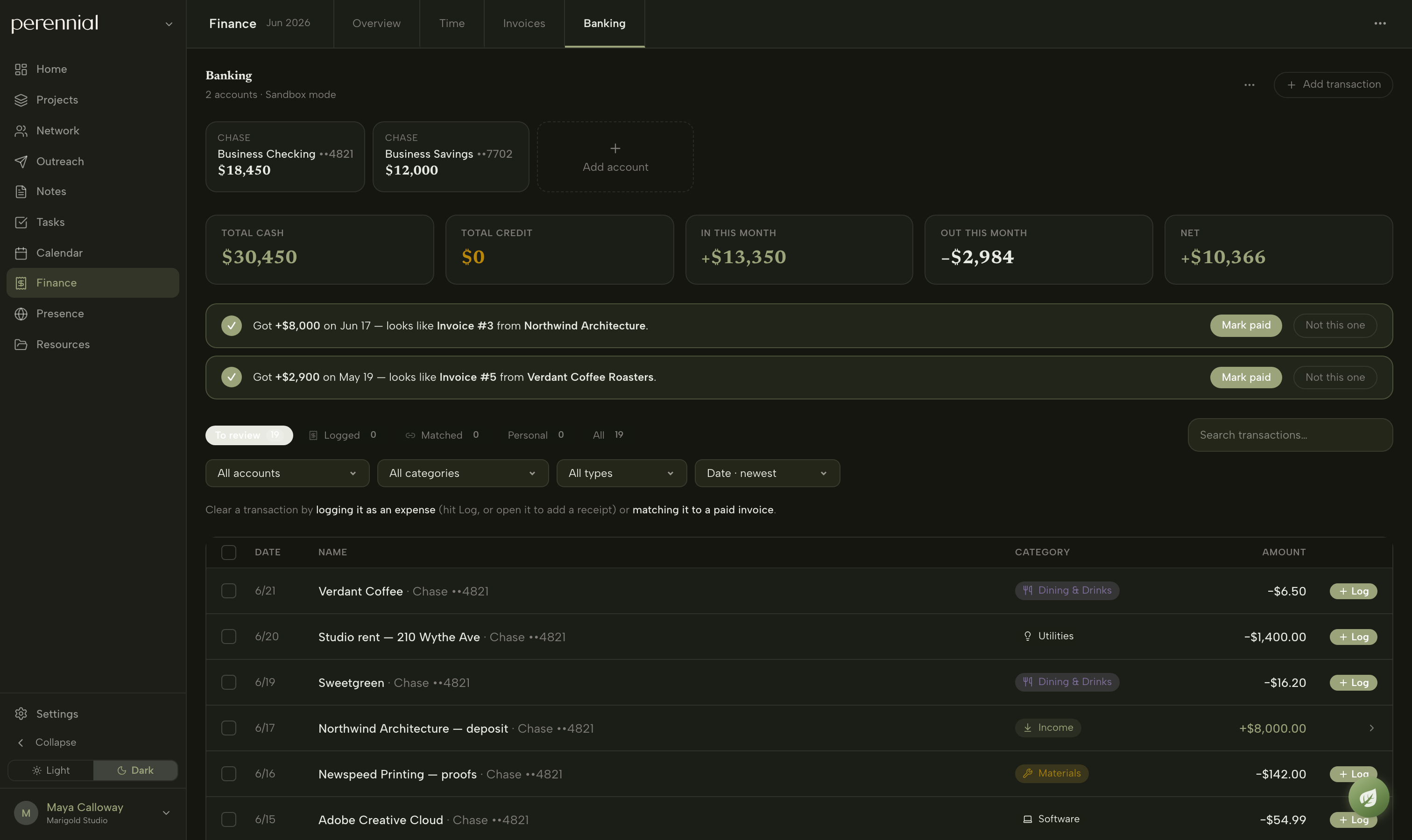 Banking in dark mode: the real feed, categorized and matched back to the invoices that produced it.